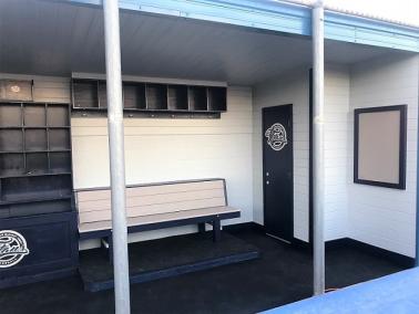 above bench storage, upper dugout storage